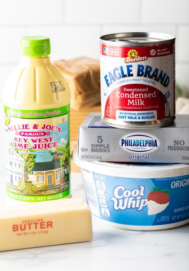Cream cheese, cool whip, lime juice, condensed milk, butter, and graham crackers.