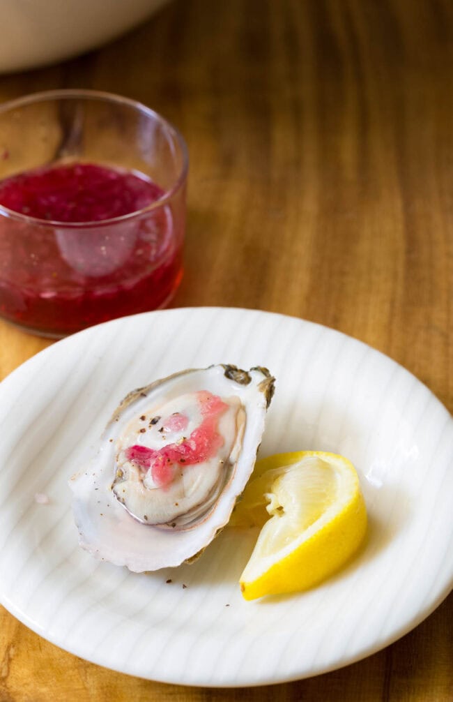 Raw Oyster with shallot mignonette on top.