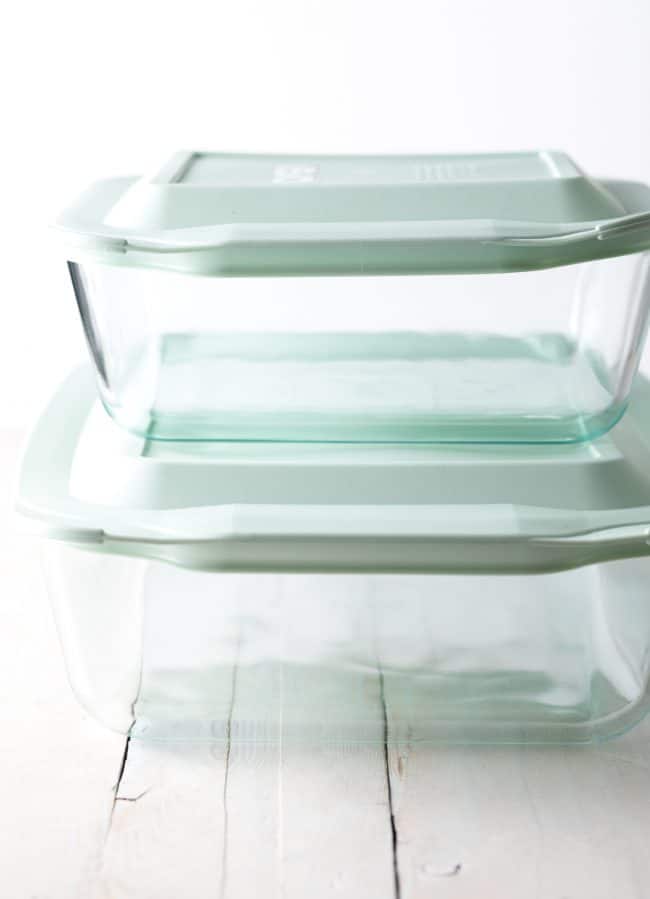 Pyrex deep dish baking dishes stacked on top of each other.