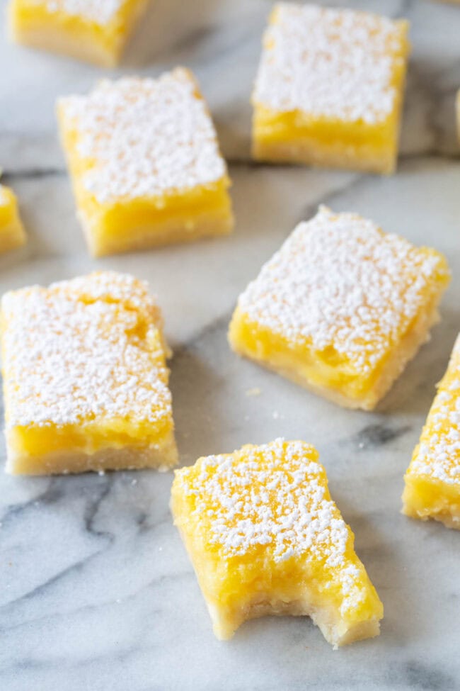 Lemon Bars #ASpicyPerspective #Lemon #Bars #LemonBars #LemonSquares #CookieCrust #WhiteChocolate #Spring #Dessert #Easter Lemon Bars