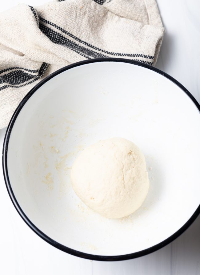 Navajo fry bread dough in a ball in a mixing bowl.