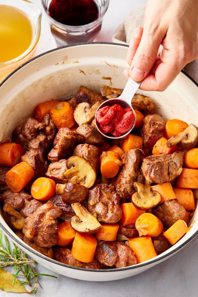 easy-venison-recipes.jpg Deer Stew Recipe in a dutch oven with tomato paste added